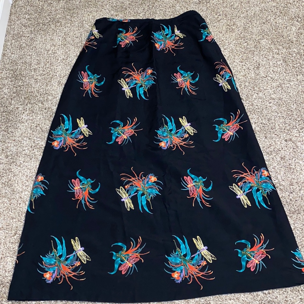 Lady’s skirt. 38 inches long 15 inches waist size 14. Lined, zipper on the side